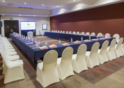 A large room with many chairs and tables